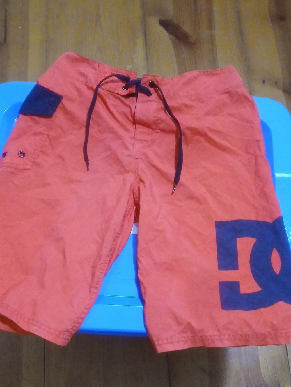 DC Men’s Orange Board Shorts with Black Logo